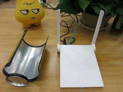 如何用易拉罐使路由器变快(路由器网速慢,用易拉罐这样做,手机无线信号立刻满格)